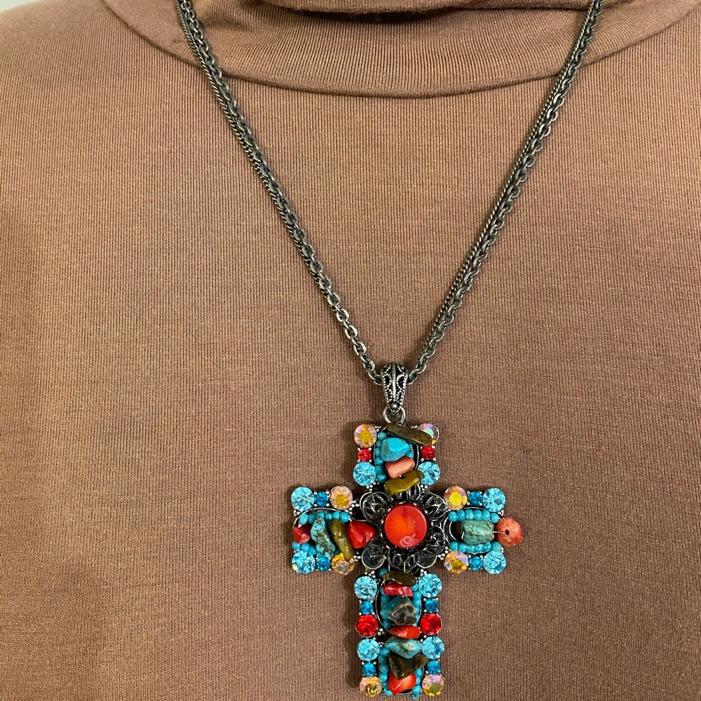 One of a kind beaded cross necklace.